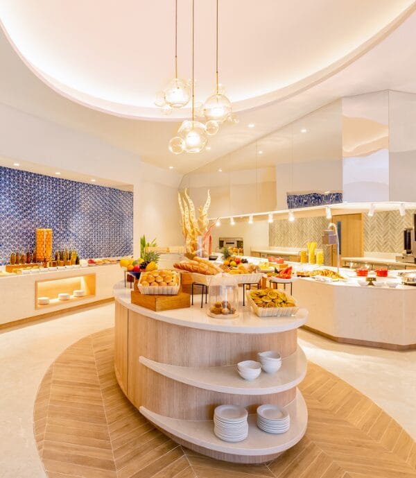 Elegant dining room with a buffet table at a luxury resort.