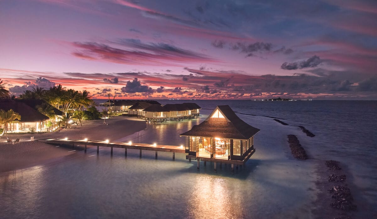 Aerial of Mizu, overwater teppanyaki restaurant at Nova Maldives during sunset